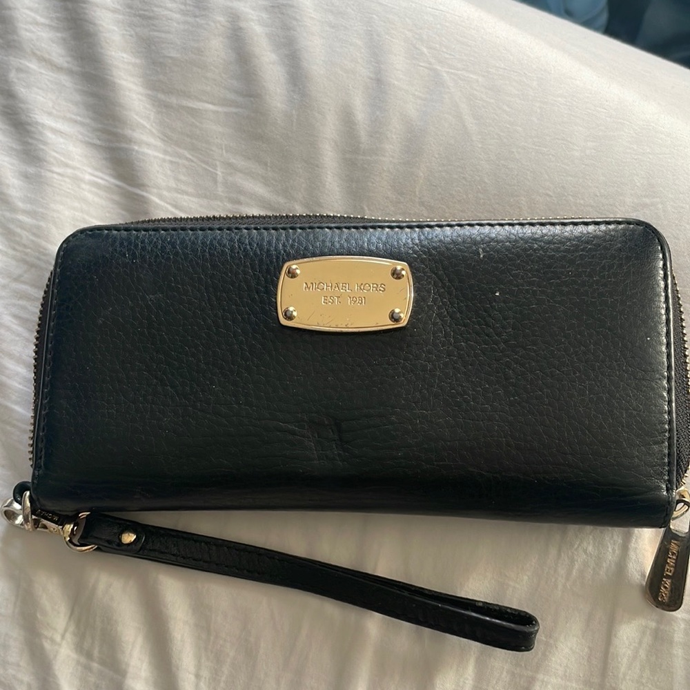 Black and gold Michael kors wristlet